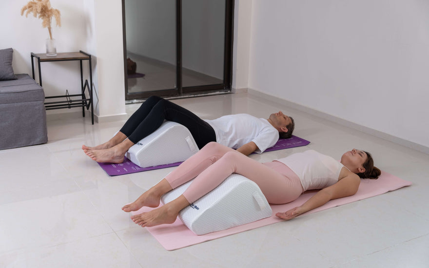 home relaxation setup featuring gel seat cushion and leg elevation wedge
