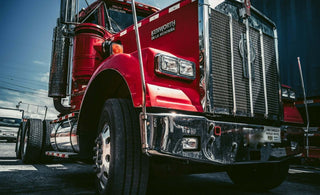truck driver using Zen Bloks XL gel seat cushion during long-distance driving  
