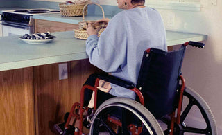 wheelchair user seated on ergonomic gel cushion for posture balance and daily comfort  